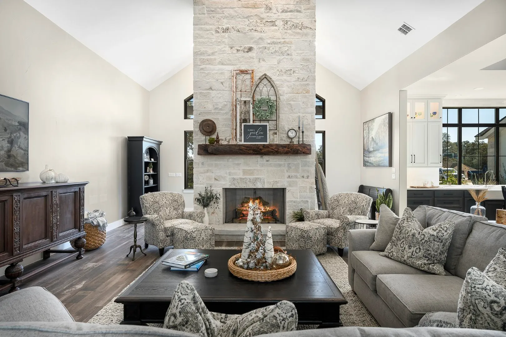 Modern living room with stone fireplace.